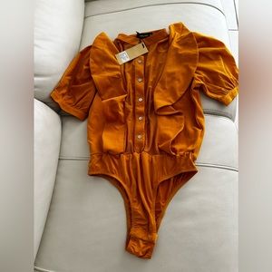 Yellow/mustard color bodysuit